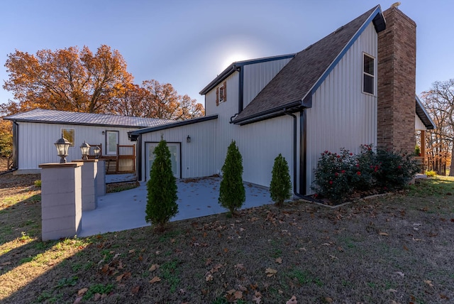 rear view of house featuring a patio area