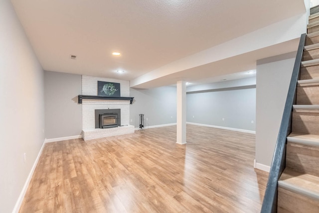 basement featuring light wood-type flooring