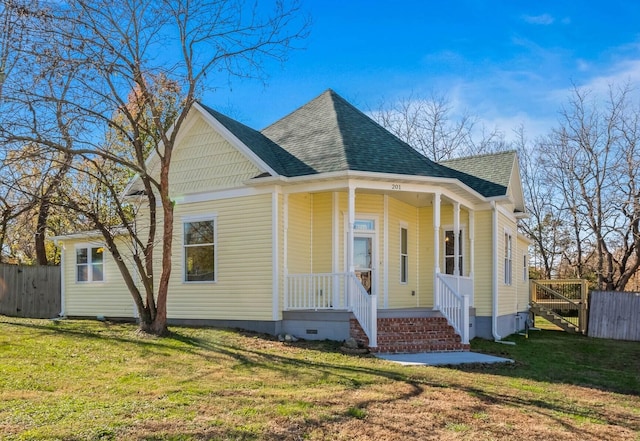 view of front of house with a front lawn and a porch