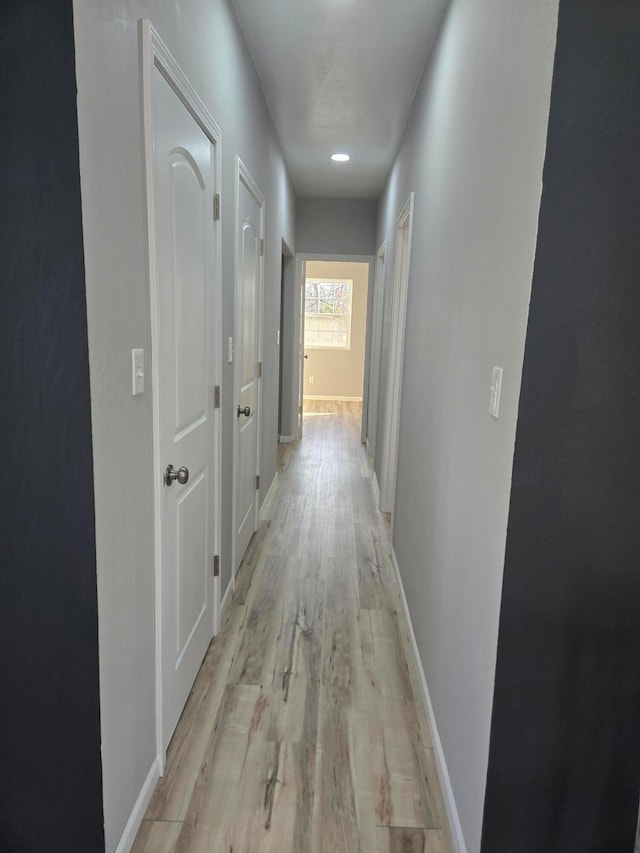 hallway featuring light hardwood / wood-style floors