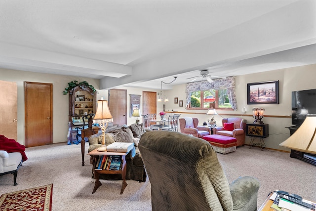 living room featuring ceiling fan and light carpet