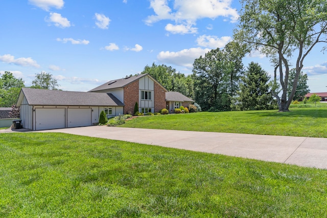 view of front of home featuring a garage and a front lawn