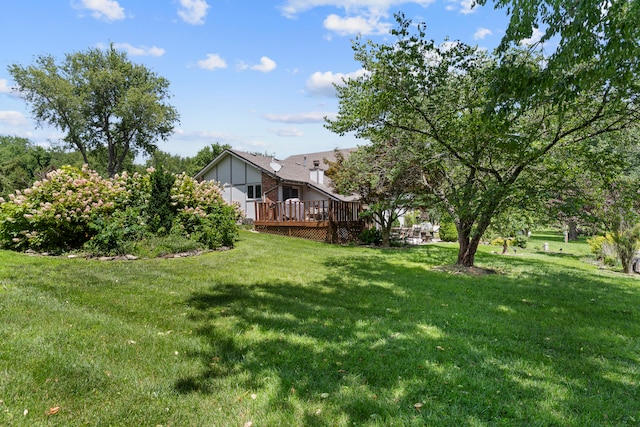 view of yard featuring a deck