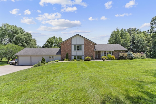 7316 E Loganwood Ln, Rogersville, MO 65742 - view of front of house with an attached garage, driveway, brick siding, and a front yard