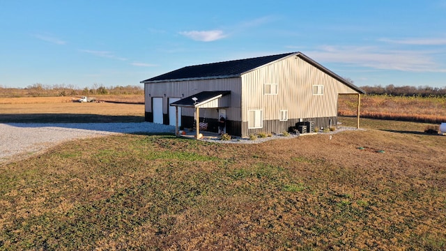 view of outdoor structure featuring a rural view