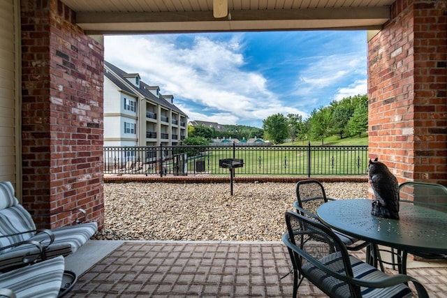 3830 Green Mountain Dr Unit 104, Branson, MO 65616 - fenced backyard featuring a patio area