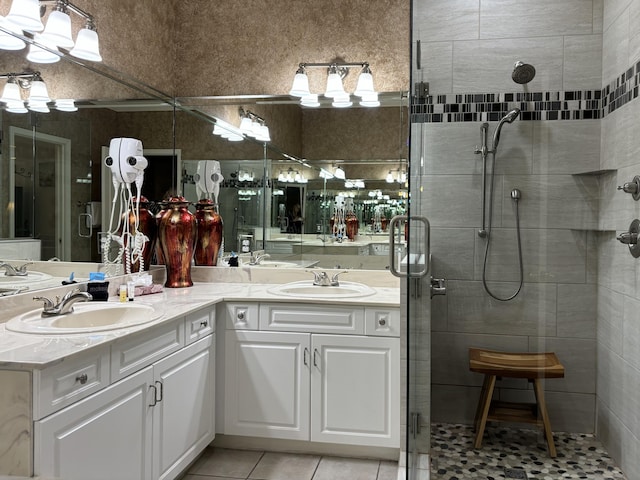 3830 Green Mountain Dr Unit 104, Branson, MO 65616 - full bathroom featuring double vanity, a stall shower, and tile patterned floors