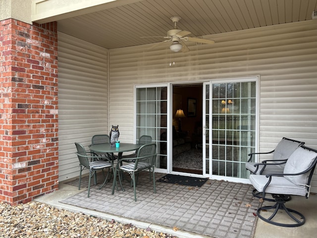 3830 Green Mountain Dr Unit 104, Branson, MO 65616 - view of patio featuring a ceiling fan and outdoor dining area
