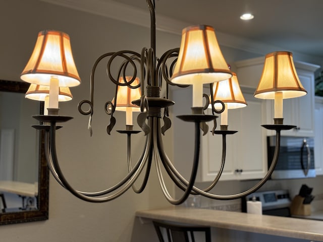3830 Green Mountain Dr Unit 104, Branson, MO 65616 - detailed view of stainless steel microwave and recessed lighting