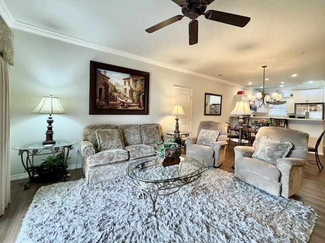 3830 Green Mountain Dr Unit 104, Branson, MO 65616 - living area featuring a chandelier, wood finished floors, ceiling fan, ornamental molding, and recessed lighting