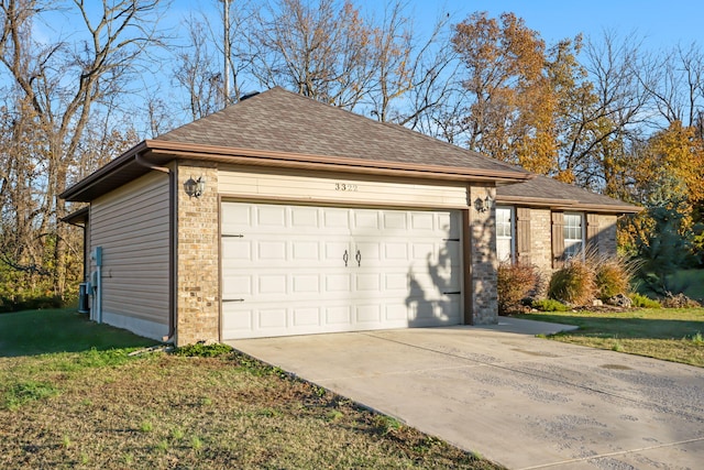 garage with a lawn