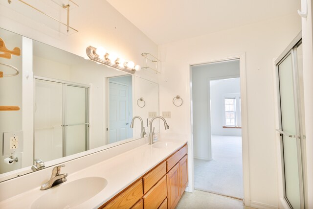 bathroom with vanity and walk in shower