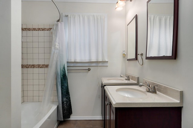 bathroom featuring shower / bath combo, vanity, and tile patterned floors