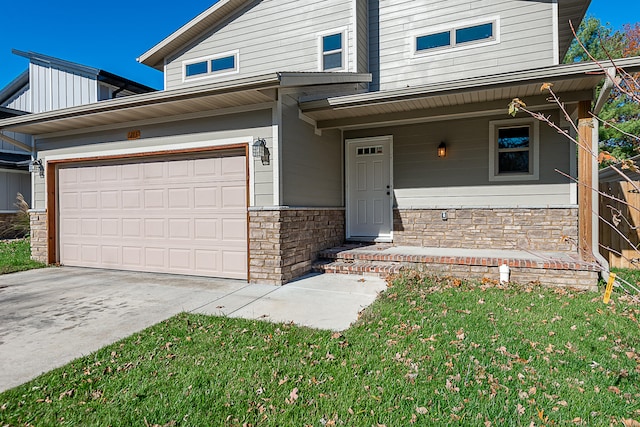 view of front of house featuring covered porch and a garage