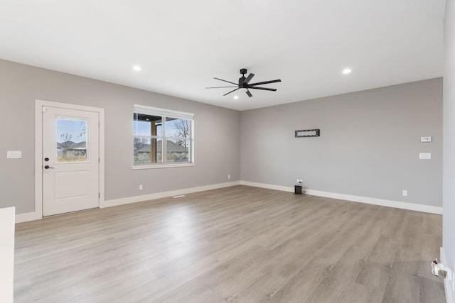 interior space featuring light hardwood / wood-style floors and ceiling fan