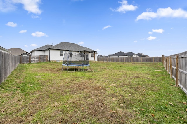 view of yard featuring a trampoline