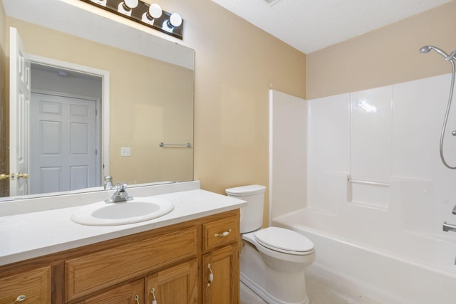 full bathroom with vanity, toilet, a textured ceiling, and bathing tub / shower combination