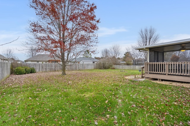 view of yard with a sunroom