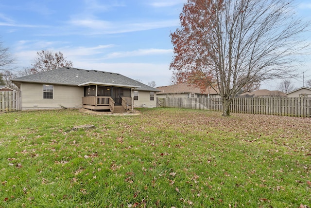 view of yard featuring a sunroom