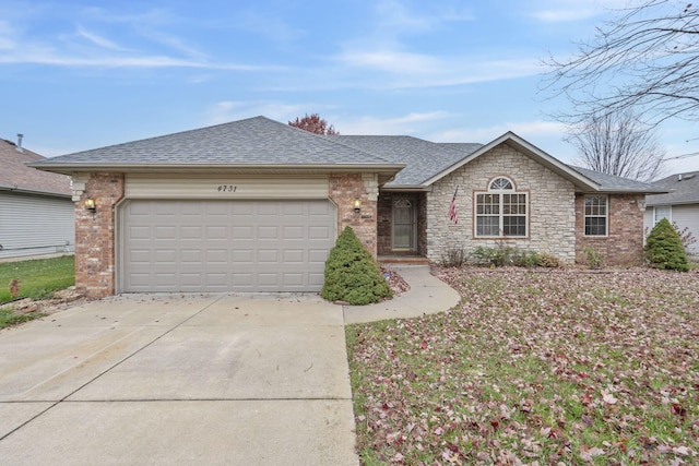 single story home featuring a garage