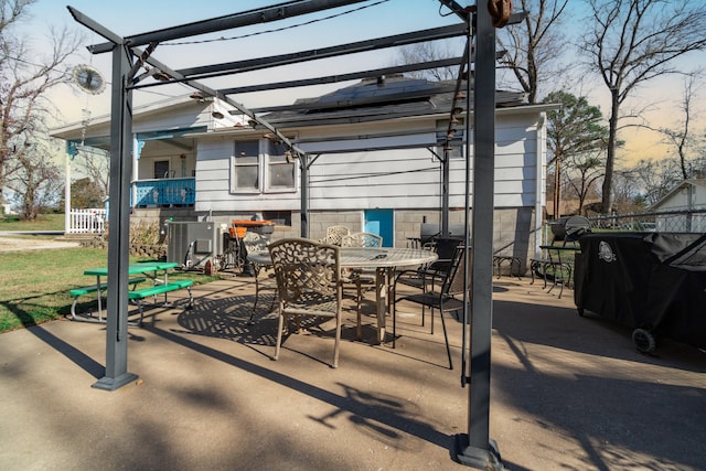 view of patio featuring a pergola, grilling area, and central AC unit