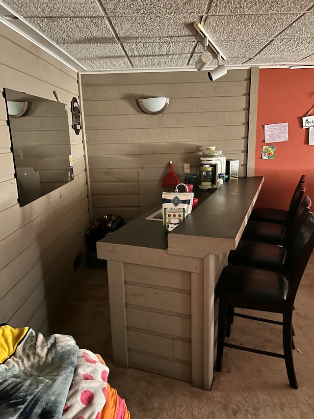 bar with dark colored carpet