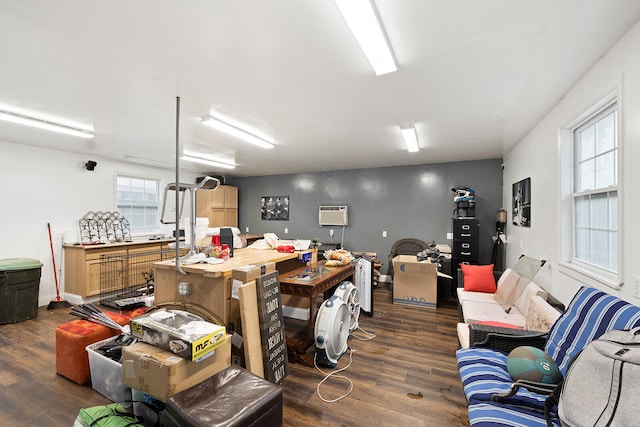 misc room featuring dark hardwood / wood-style floors and a wall mounted AC