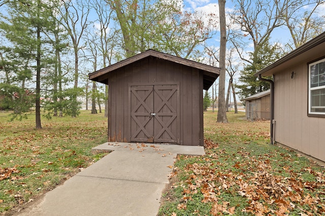 view of outdoor structure with a yard