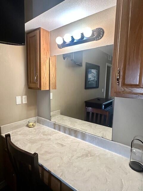 kitchen with a textured ceiling