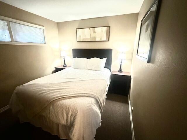 bedroom featuring carpet flooring