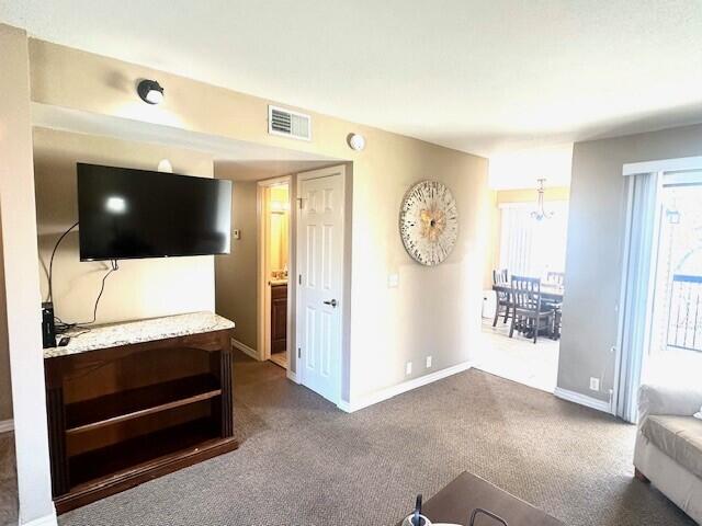 living room featuring carpet floors