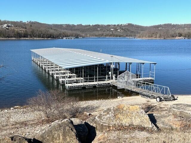 view of dock with a water view