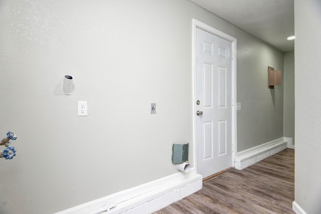 hall with light wood-type flooring