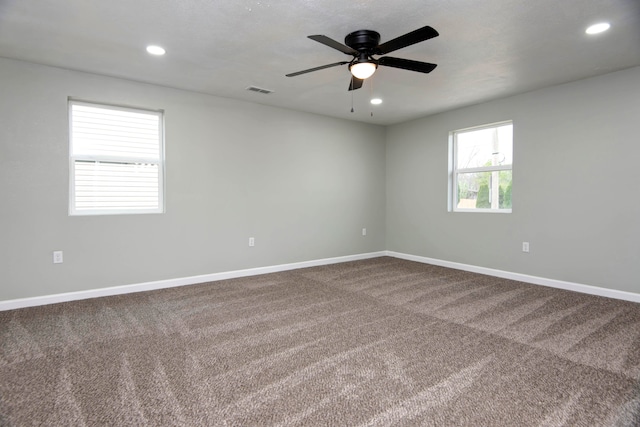 carpeted empty room with ceiling fan