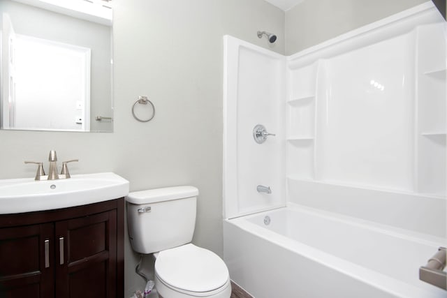 full bathroom with shower / bathing tub combination, vanity, and toilet