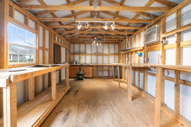 storage room featuring a wall mounted air conditioner