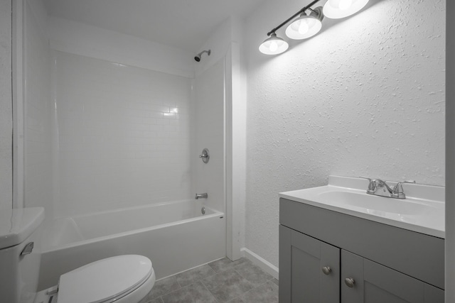 full bathroom featuring tile patterned flooring, shower / tub combination, vanity, and toilet