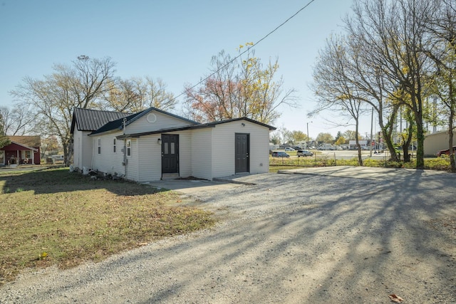 exterior space with a yard