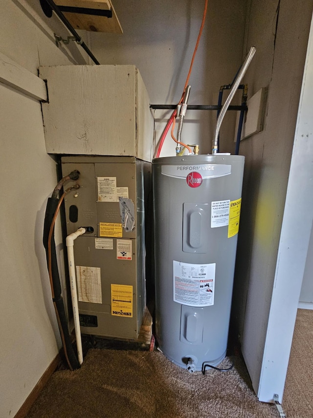 utility room featuring electric water heater