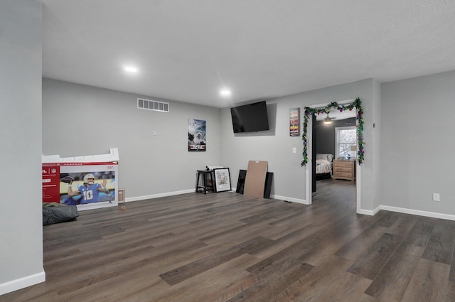 interior space with dark hardwood / wood-style floors