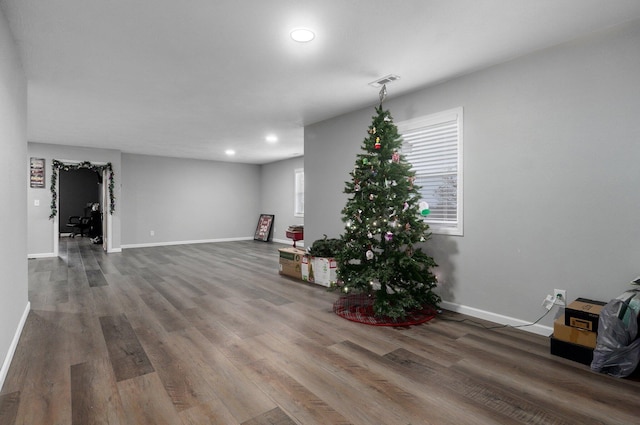 interior space with hardwood / wood-style flooring