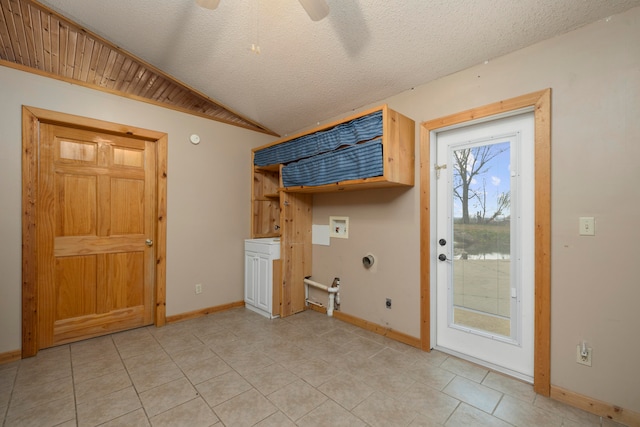 laundry area featuring hookup for an electric dryer, light tile patterned floors, a textured ceiling, and ceiling fan