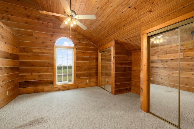 bonus room with carpet flooring, wooden walls, wood ceiling, and lofted ceiling