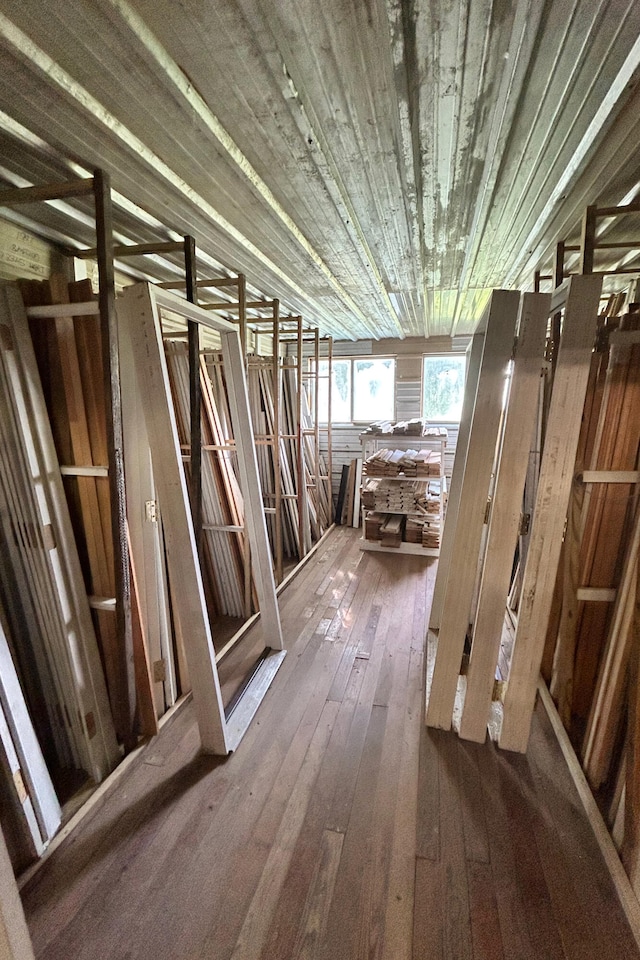 miscellaneous room with wood-type flooring