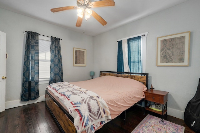 bedroom featuring ceiling fan and dark hardwood / wood-style flooring