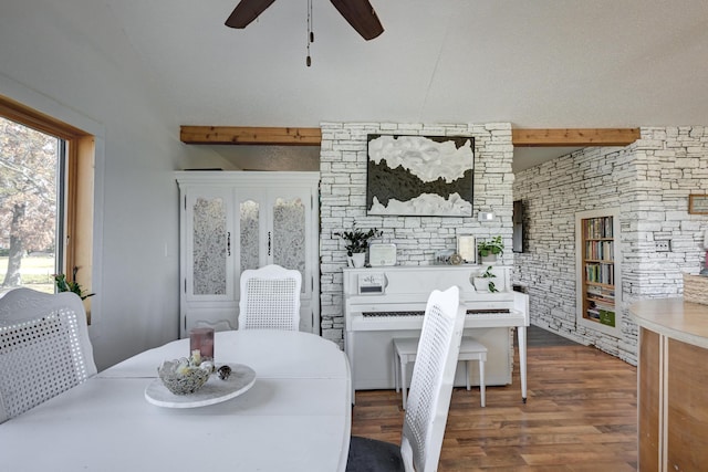 dining area with hardwood / wood-style floors and ceiling fan