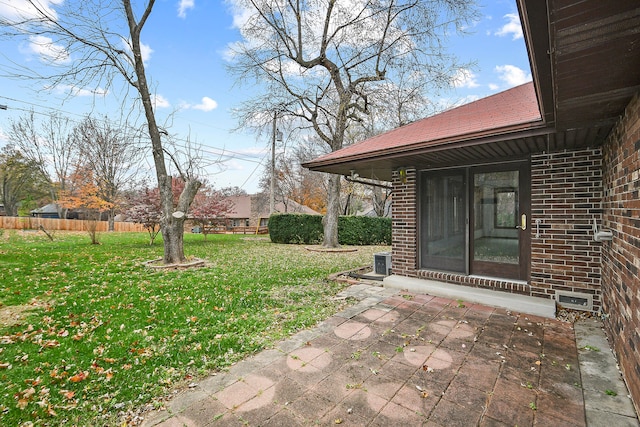 view of yard with a patio and central AC