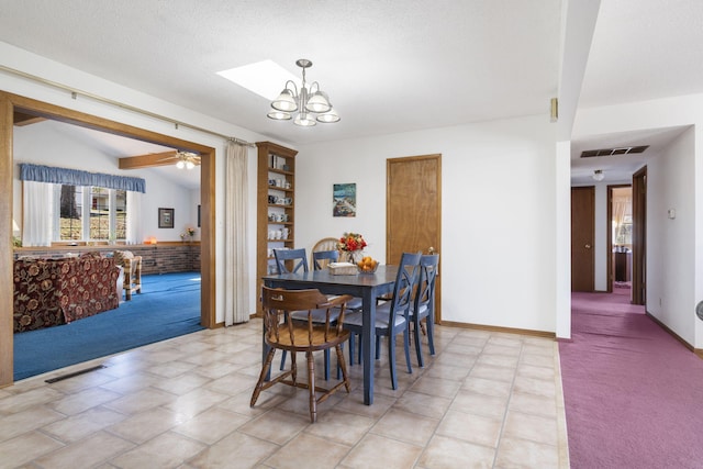364 W Rd, Branson, MO 65616 - dining area featuring light carpet, a chandelier, and ceiling fan