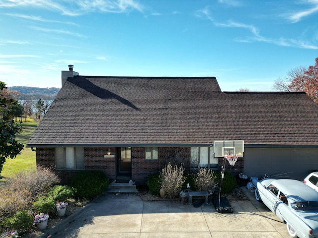 single story home featuring a garage