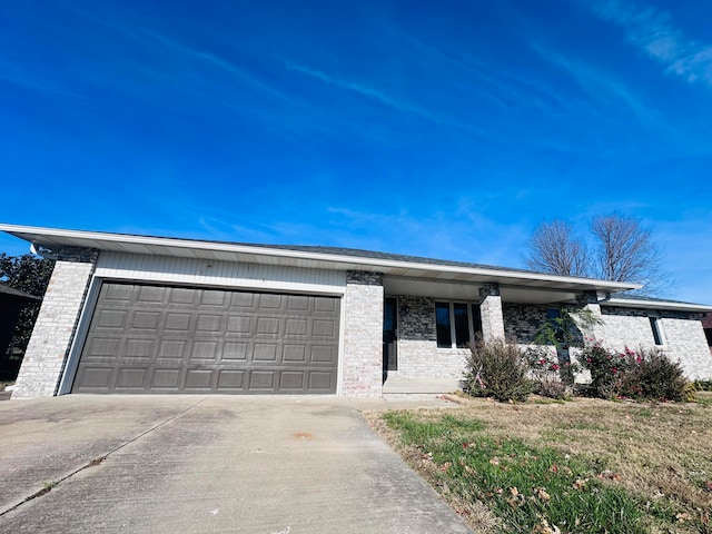 single story home with a garage